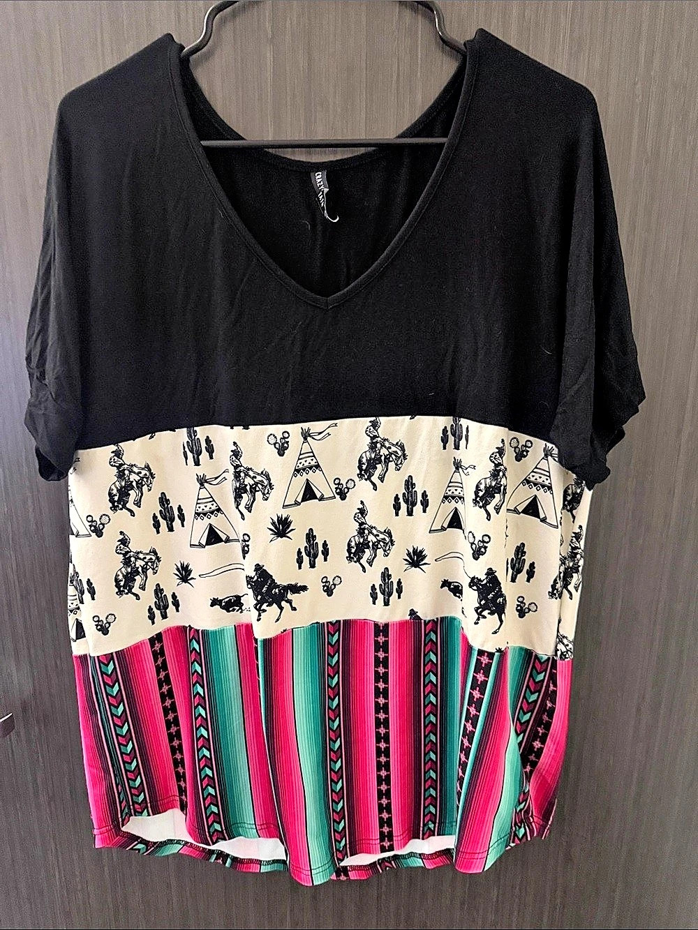 Western pattern tunic. Very soft material. Cute colors and patterns.